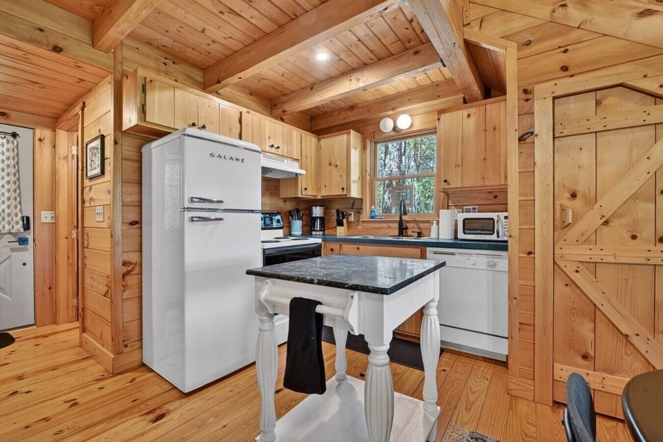 A charming cabin kitchen with everything you need for a comfortable stay
