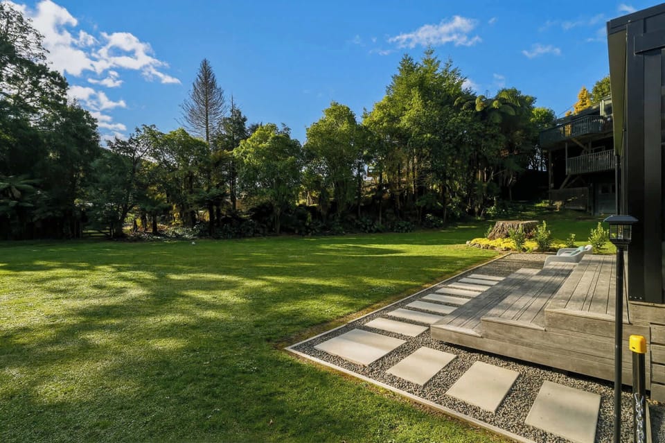 The front yard is huge, and our robot lawnmower takes care of the grass. 
