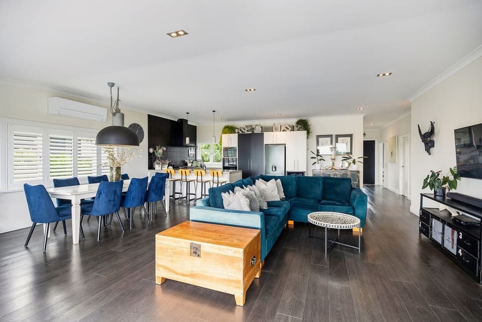 Open plan living, dining and kitchen, with beautiful ocean views