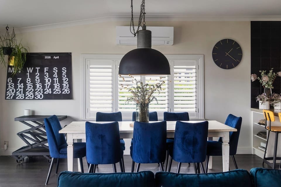 Open plan living, dining and kitchen, with beautiful ocean views