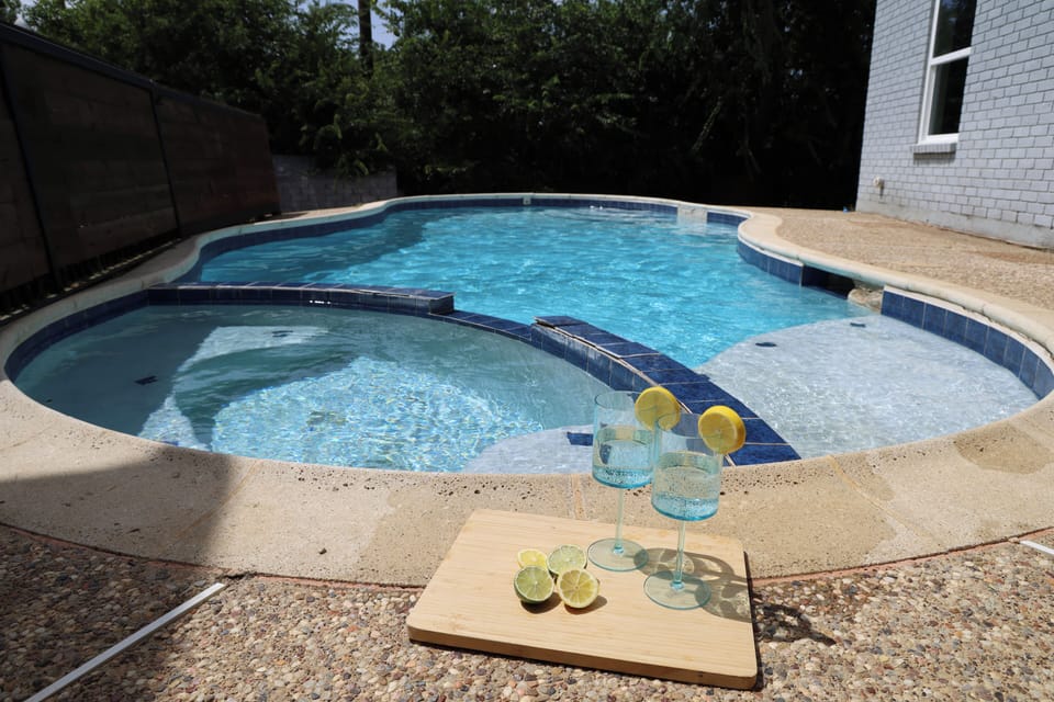 Private pool oasis with spa ledge and a relaxing, resort-style vibe