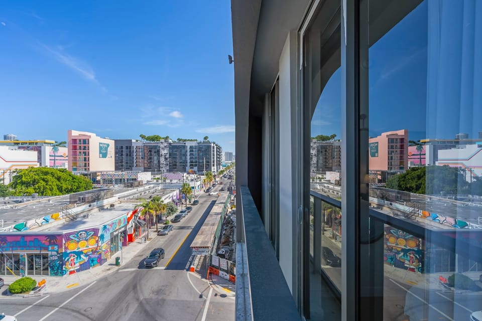 Step out onto the balcony & take in the view of the city​