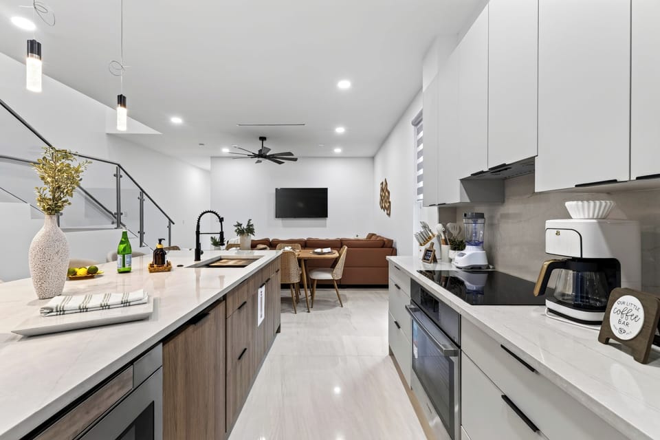 The fully equipped kitchen offers generous counter space and an open layout designed for easy group meals.
