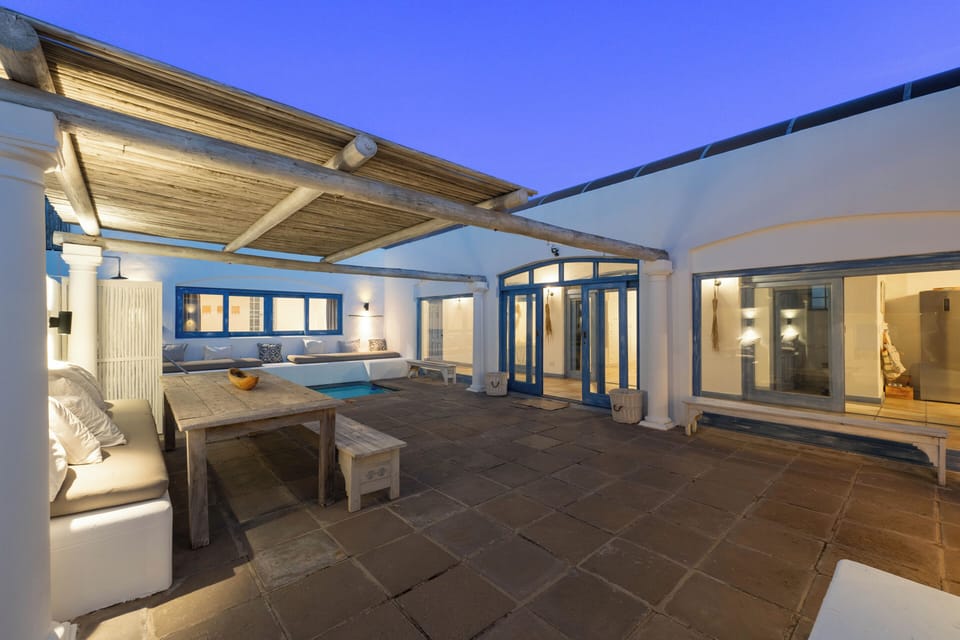 The outdoor area with a pool