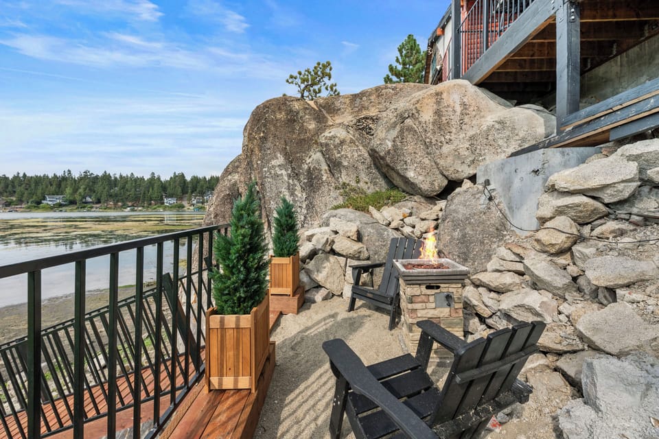 Lower Deck - Lower Deck with fire pit, private dock, and lake views