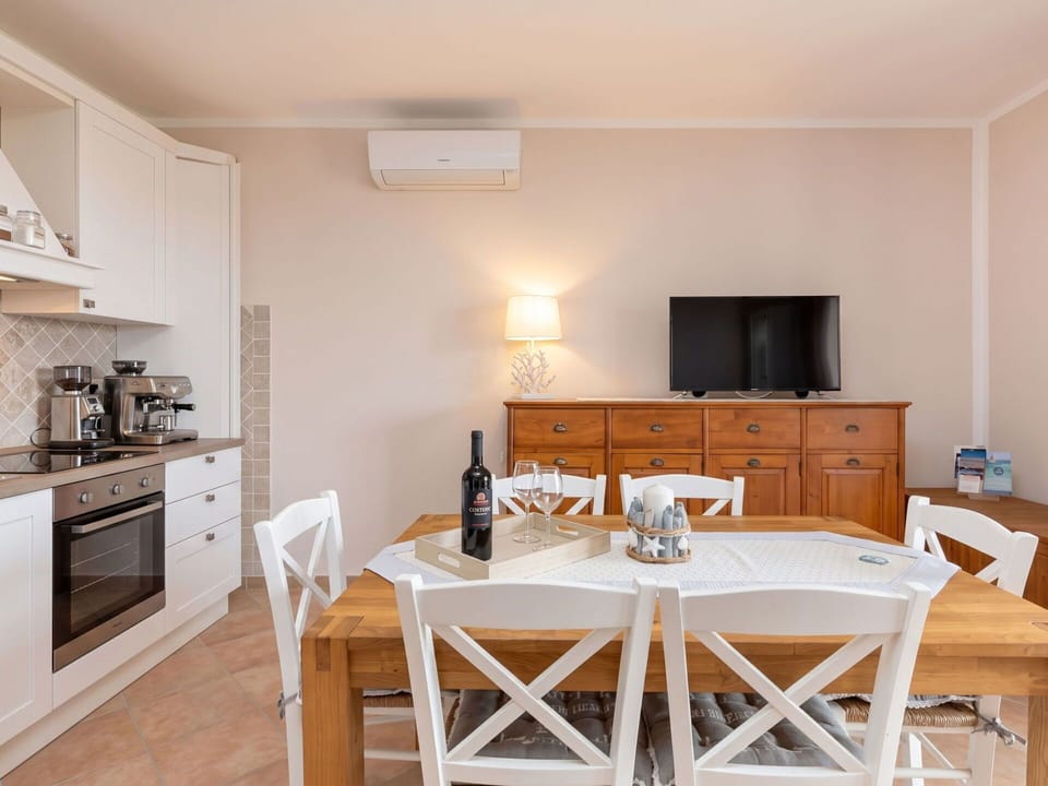 Furniture, Interior Design, Flooring, Floor, Wood, Ceiling, Room, Lighting, Cabinetry, Table