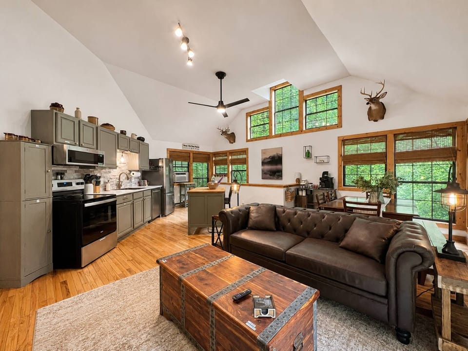 The heart of the cabin, an inviting open-concept space designed for gathering, relaxing, and making memories.