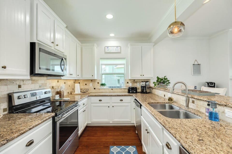 Fully equipped kitchen with stainless steel appliances