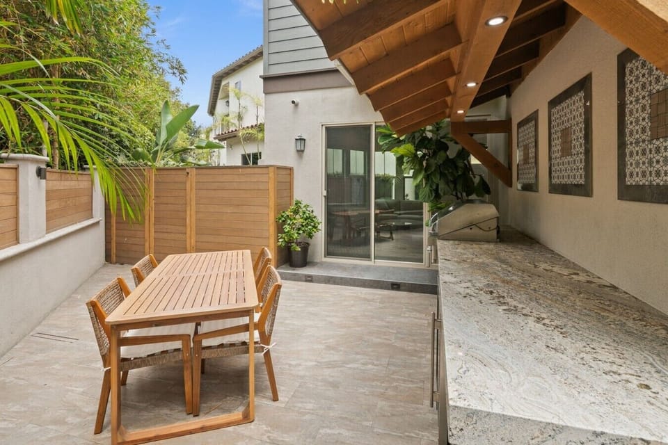 Private outdoor dining with summer kitchen