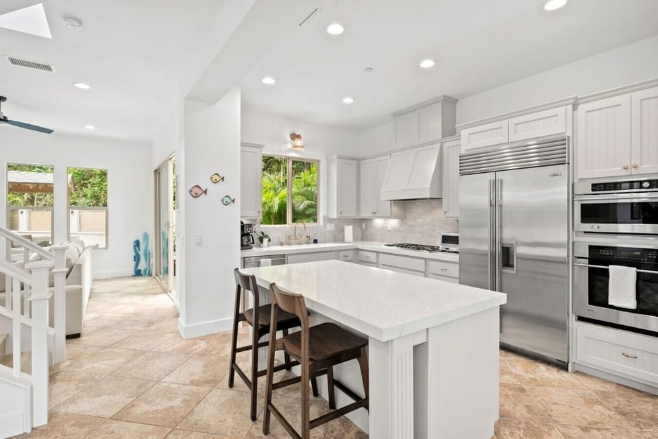 Chef`s kitchen, central to the living room, formal dining, and family room