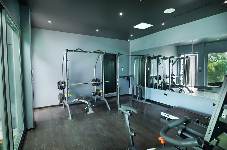 Build strength with full equipment and mirrored training space