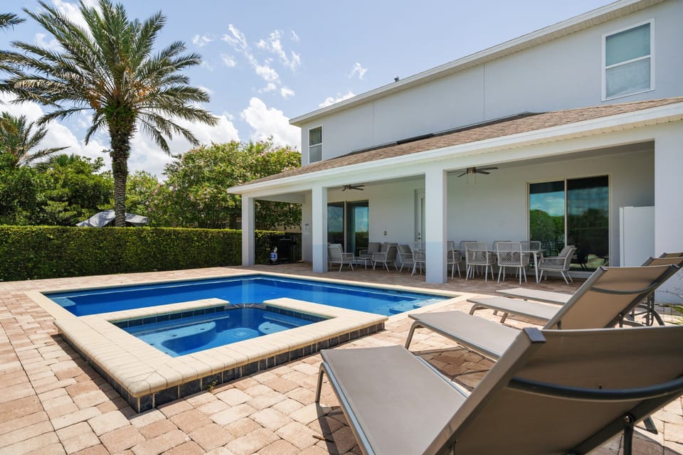 Private pool and spa with spacious outdoor deck for relaxing after a day at the theme parks.