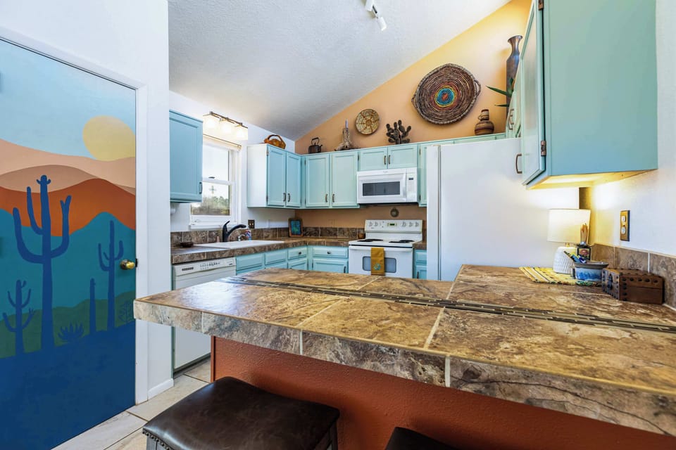 Cook with the breakfast bar behind you and everything within reach