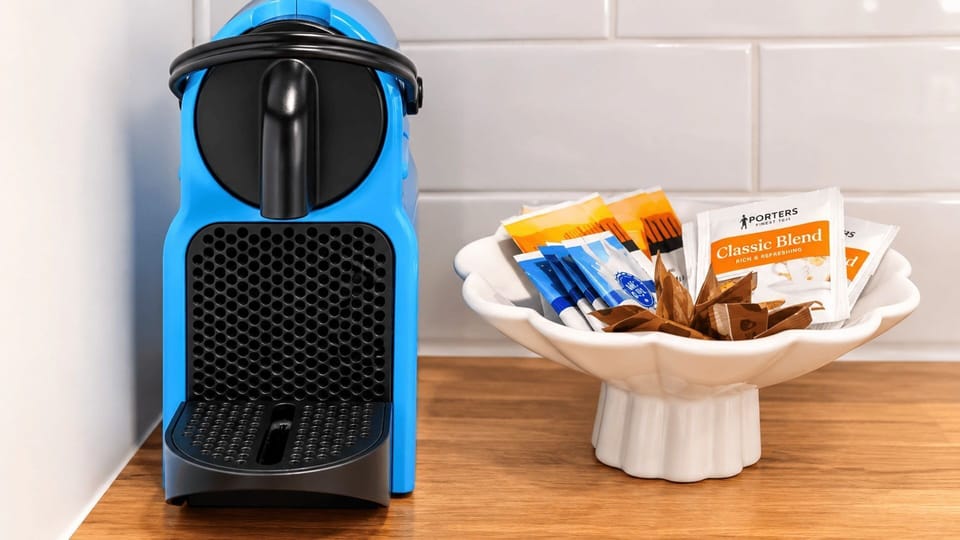 Pod coffee machine with complimentary tea, coffee and sugar provided for your stay.
