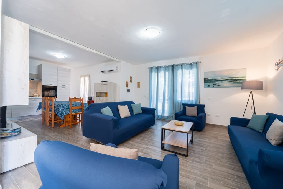 Bright open-plan lounge with ample seating and dining area