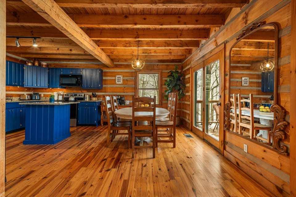 A spacious dining area just steps from the kitchen and deck—perfect for gathering after a day of adventure.