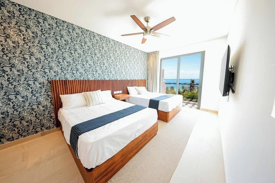 Bedroom with two double beds 