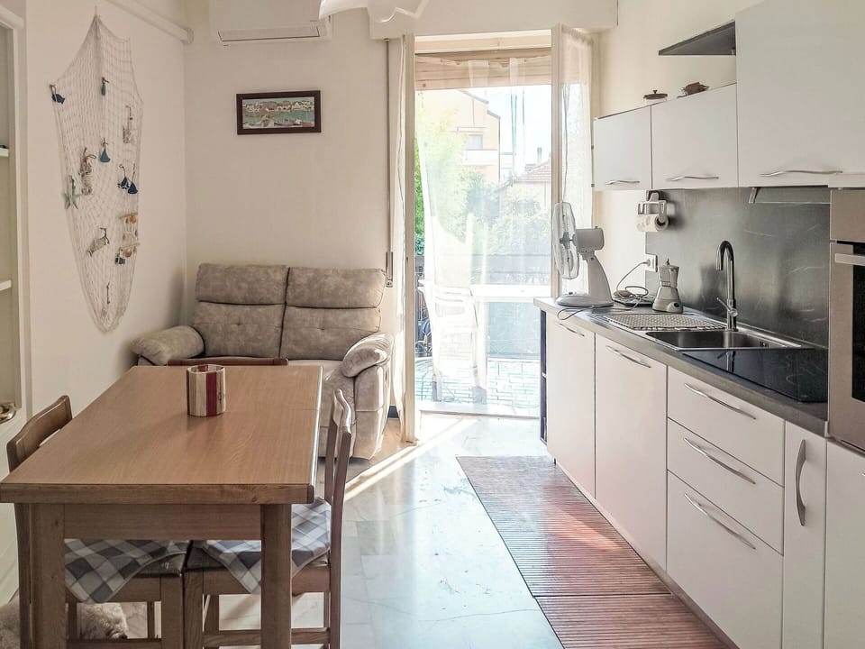 Furniture, Flooring, Interior Design, Floor, Wood, Kitchen, Chair, Major Appliance, Kitchen Appliance, Kitchen & Dining Room Table