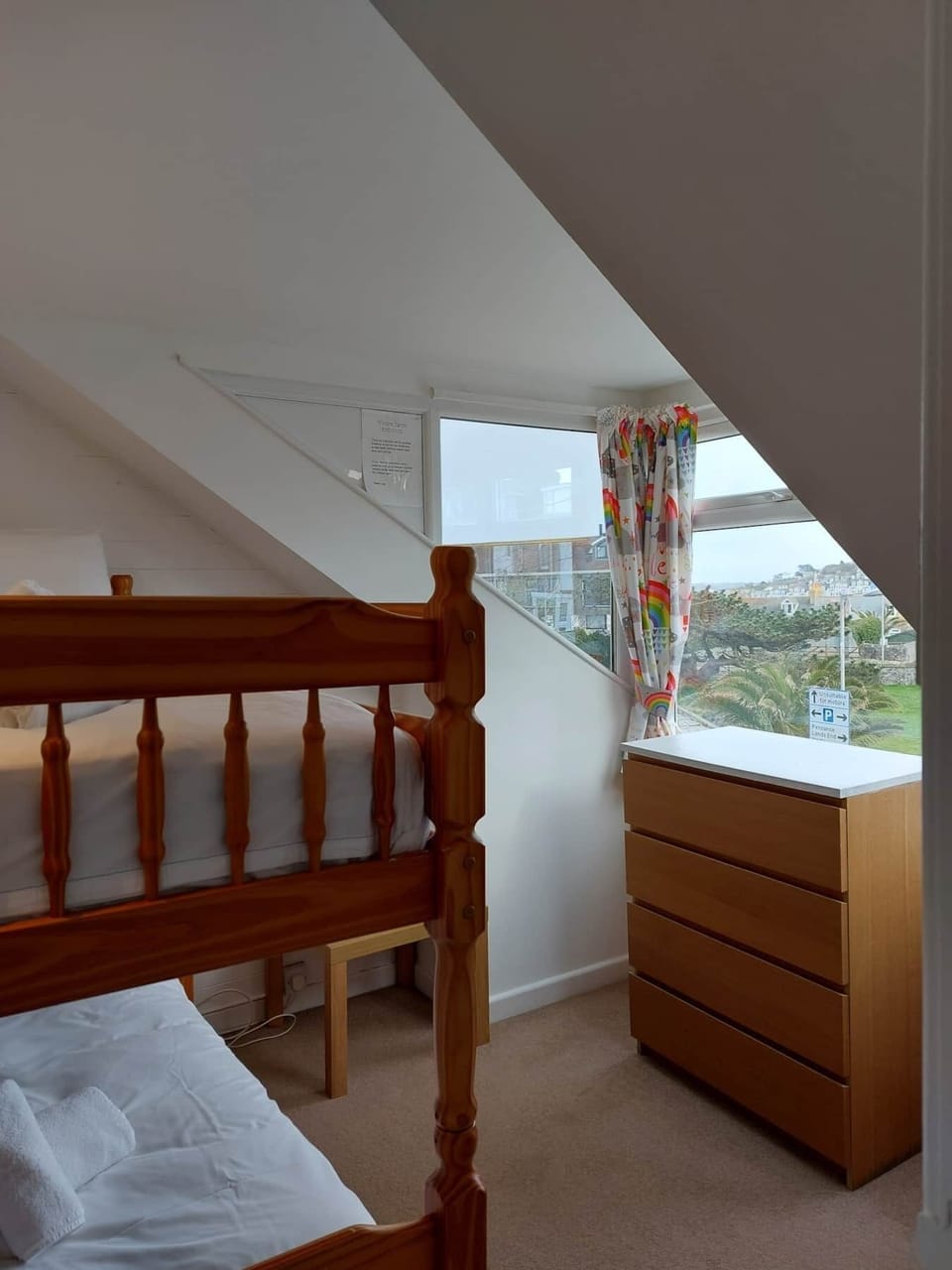 Bedroom 4, with full sized bunk bed, white linen and towels