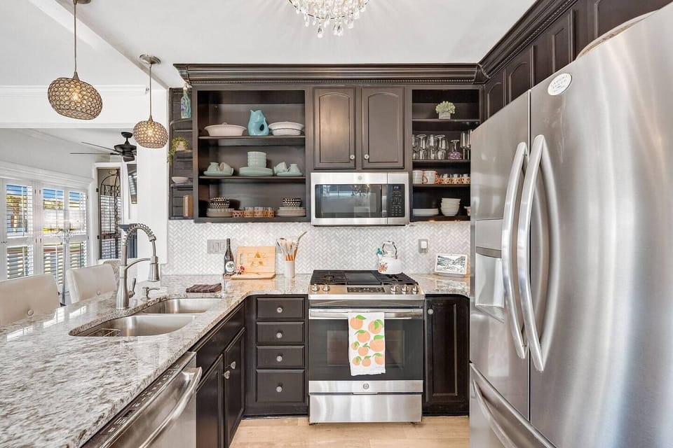 See the sparkle of the crystal cabinet hardware? Handy gadgets await you within those drawers and cabinets. Have fun!