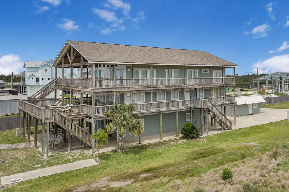 Multi-level waterfront home with private dock access, spacious outdoor living, and room for large groups.