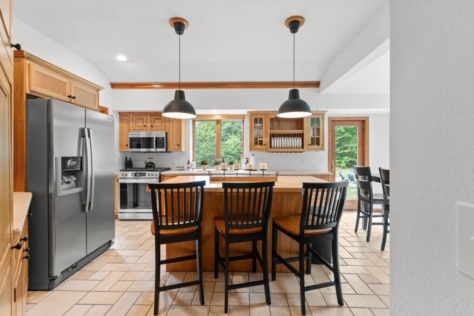 This is a house where people naturally end up gathering around the kitchen island.