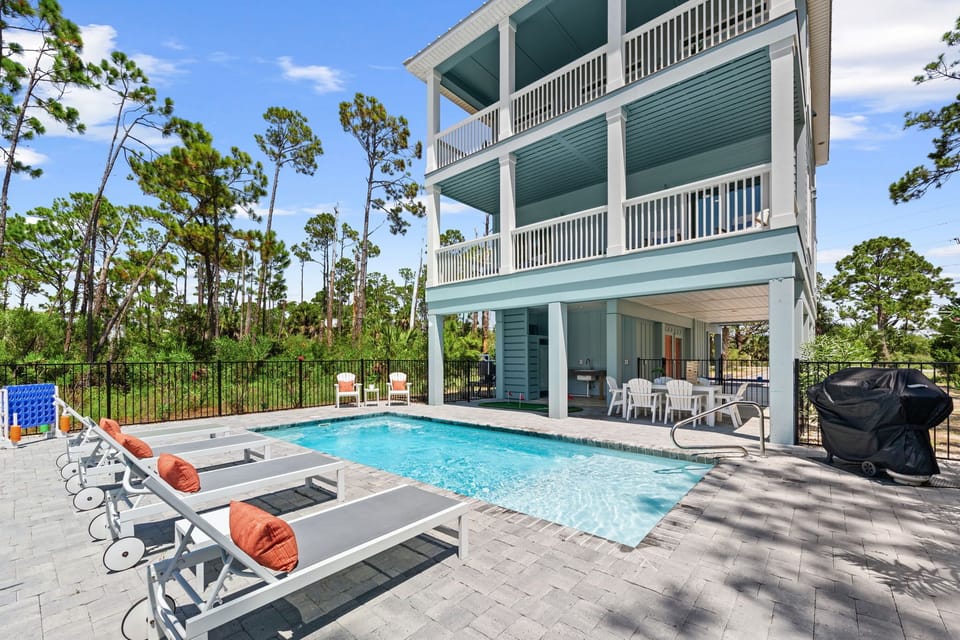 Cool off in the private pool after a day at the beach, then relax poolside on the comfortable lounge chairs and listen to the waves.
