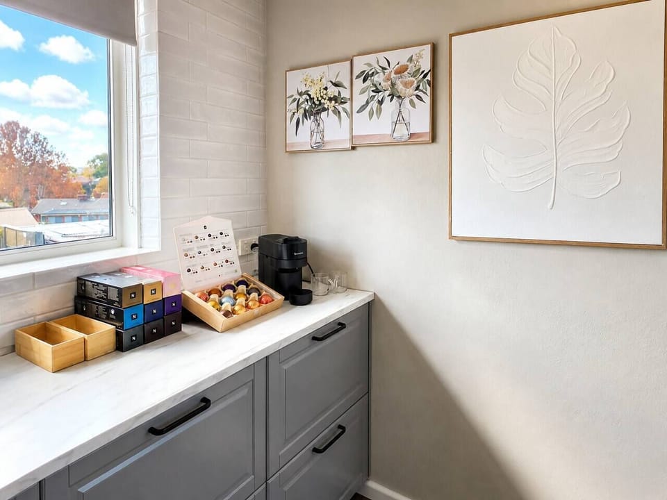 Plenty of bench space and storage with a sunny window outlook — unpack the groceries and make yourself at home.
