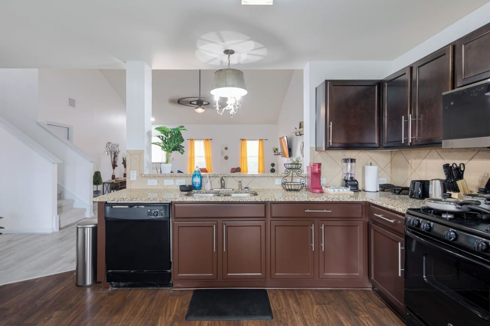 Fully equipped kitchen with full-size appliances and generous counter space makes home-cooked meals easy. Ideal for crew stays, construction projects, insurance housing, corporate relocations and families spending an extended stay in Kyle, TX.