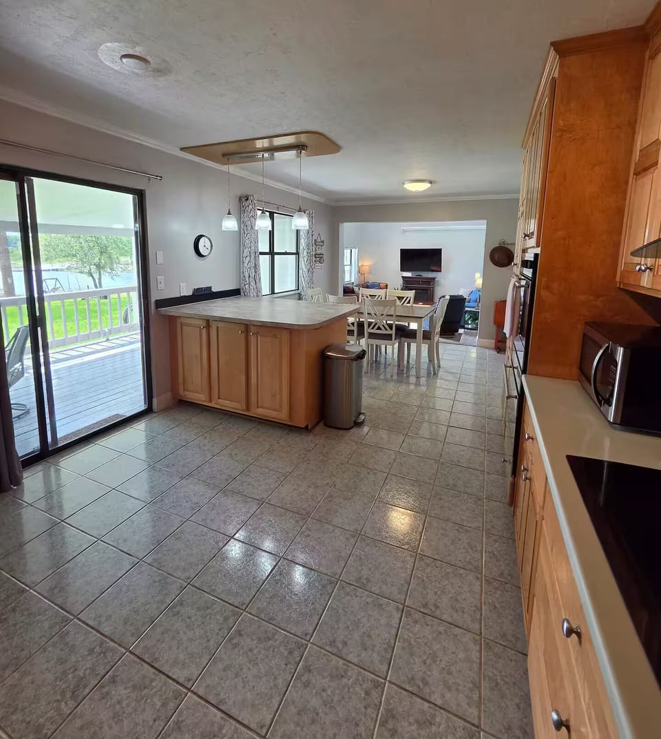 Open concept flow from kitchen, to dining area to living room