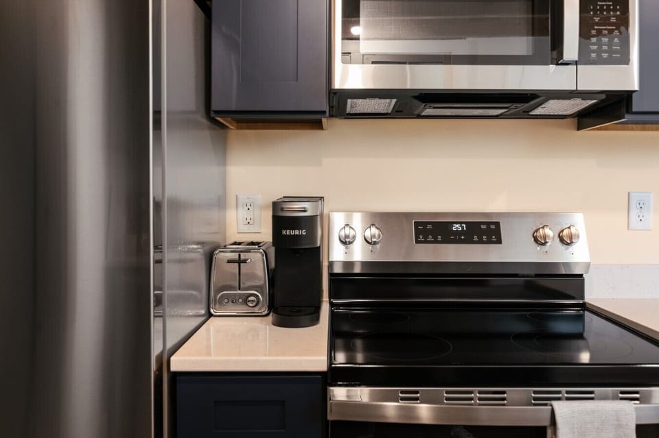 Cook your favorite meals easily with this modern stove and oven setup! 🍳🔥✨