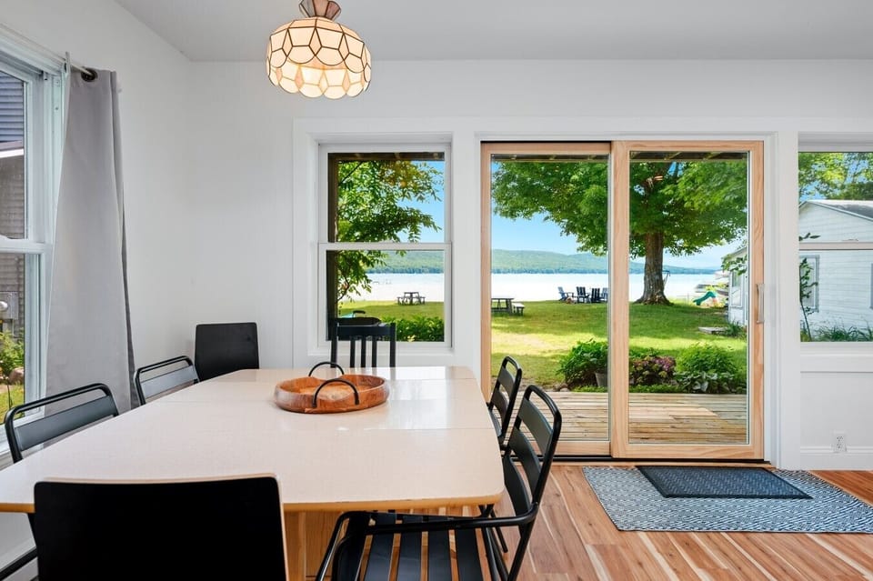 Bright and airy indoor view looking out toward the green lawn and trees! 🪟🌳☀️