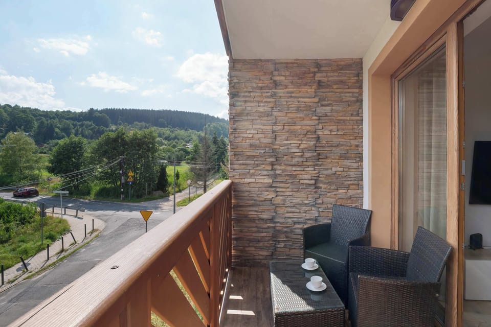 The balcony provides a perfect spot for enjoying the fresh air.