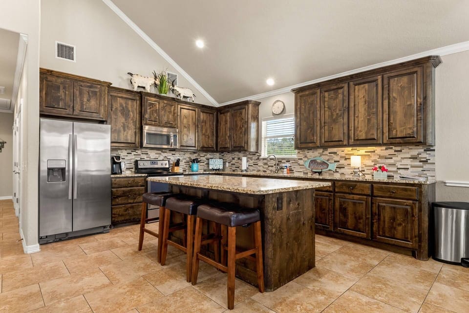 Open New Braunfels river‑rental layout perfect for cooking together, hanging out, and easy group meals.