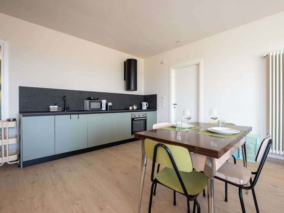 Furniture, Interior Design, Flooring, Kitchen, Wood, Countertop, Floor, Kitchen & Dining Room Table, Lighting, Table