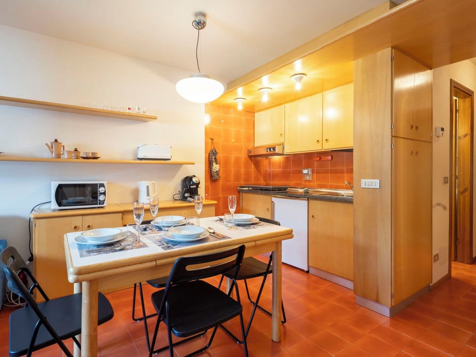 Interior Design, Flooring, Wood, Kitchen, Furniture, Ceiling, Floor, Room, Countertop, Cabinetry