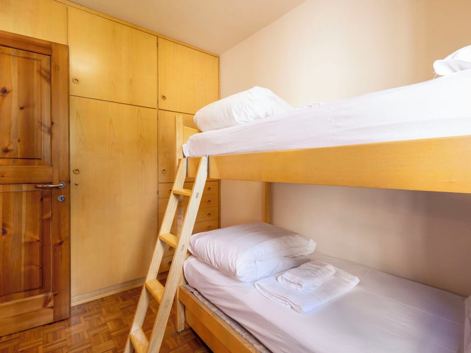 Wood, Bed, Interior Design, Floor, Bedroom, Flooring, Furniture, Ceiling, Bunk Bed, Room