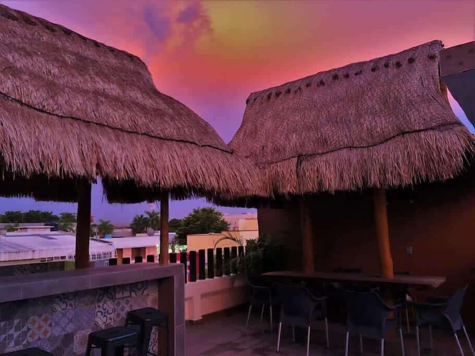 Shared rooftop terrace at sunset
