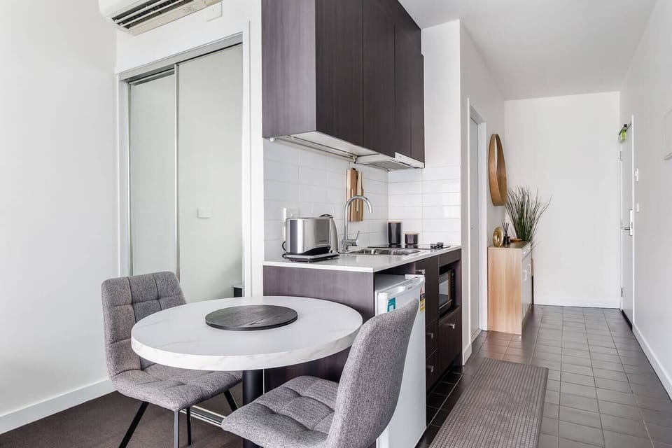 Share a casual bite or morning coffee at the round table for two.