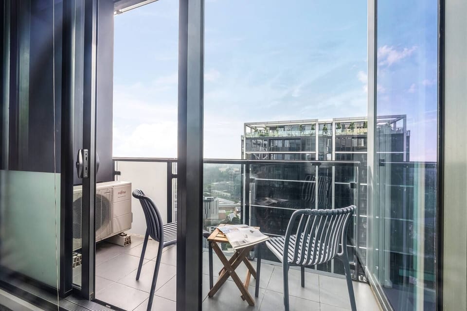 Step onto your private balcony and enjoy a quiet moment with a coffee or evening drink above the city.