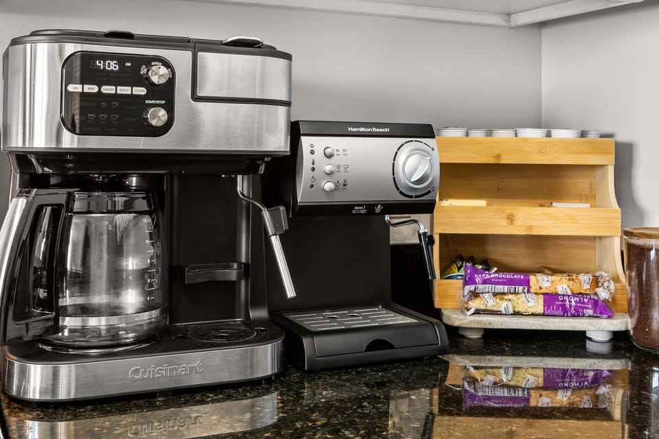 Enjoy carafe, single-serve Nespresso and K-cup pods, espresso and milk steamers