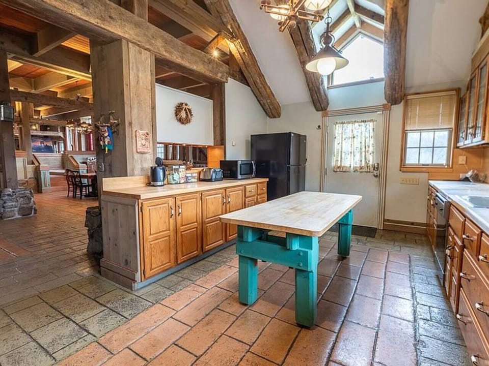 The large kitchen leads directly into the huge dining room.