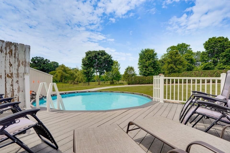 Spacious backyard with pool and a lounge area where you, your family and friends can relax and unwind.