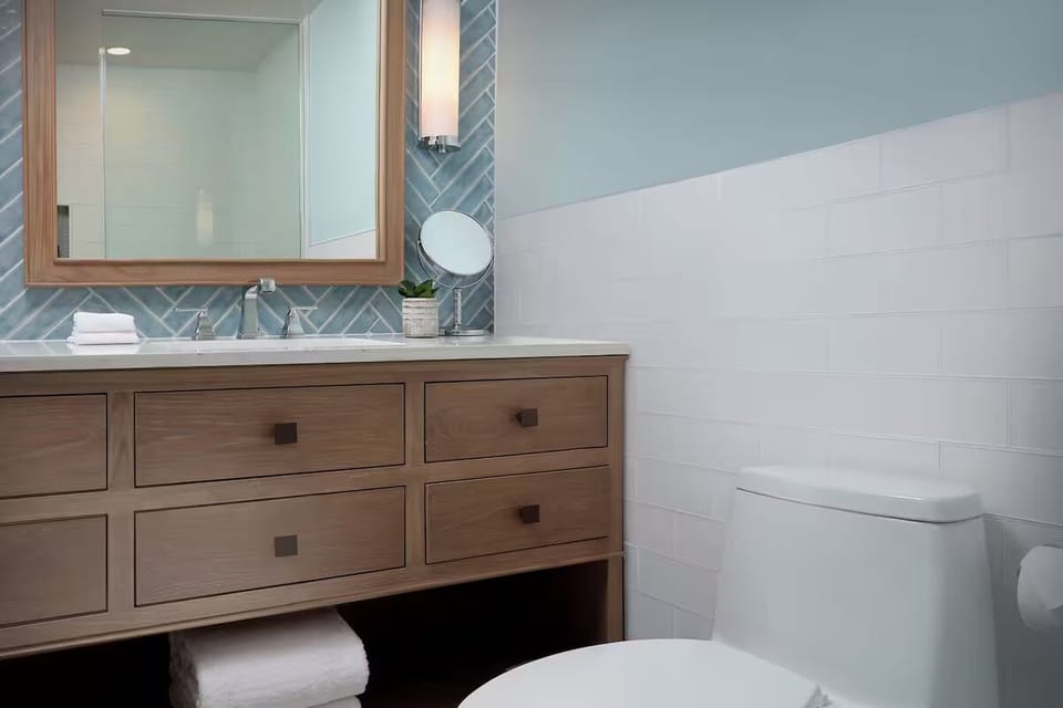 Get ready with ease at a roomy vanity and spa lighting.