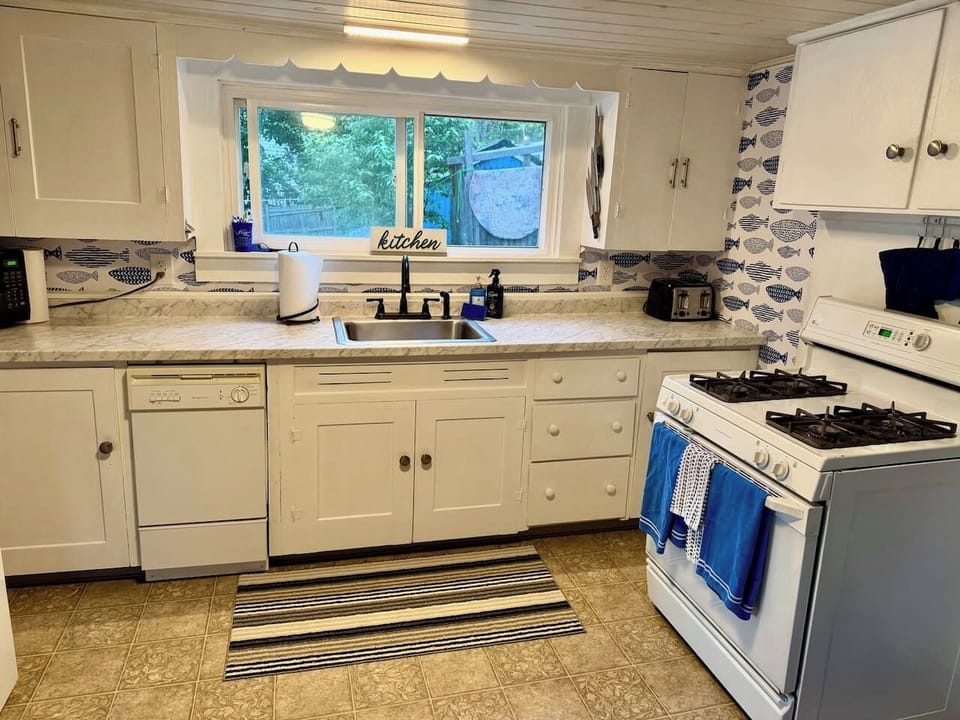Our updated kitchen features all the comforts of home, including a dishwasher :) 