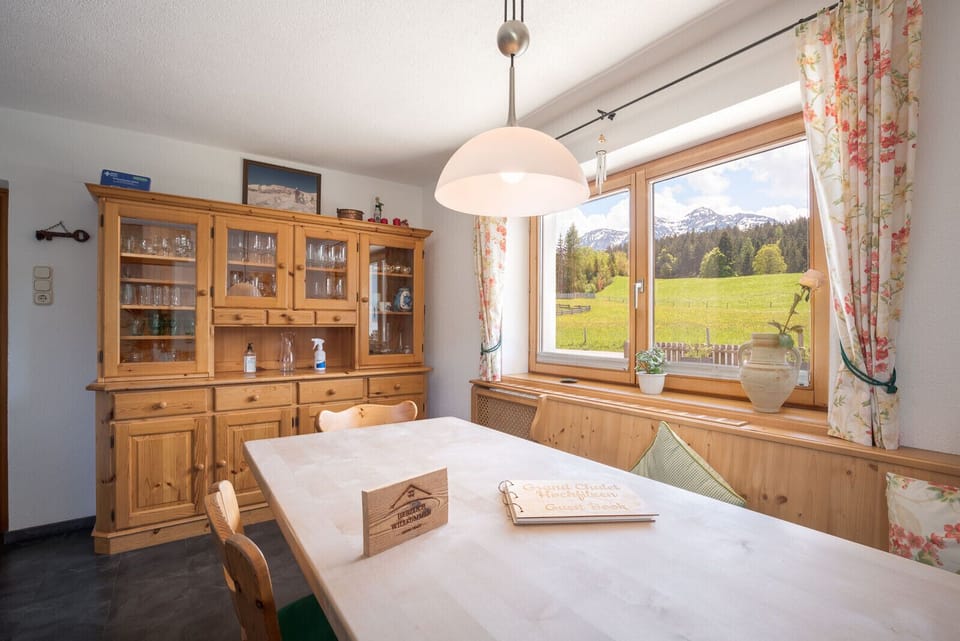 Large Hochfilzen vacation rental with bright dining room, rustic wood interior and room for family meals or group stays.