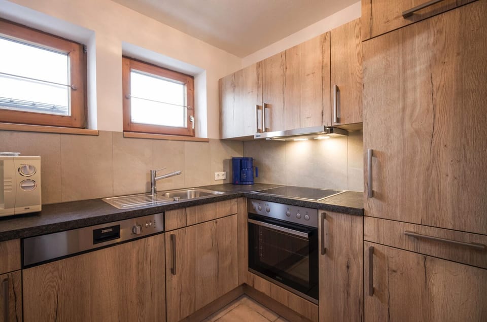 Westendorf vacation rental with modern kitchen, dishwasher, oven, coffee maker and a convenient base for ski trips, hiking and biking.