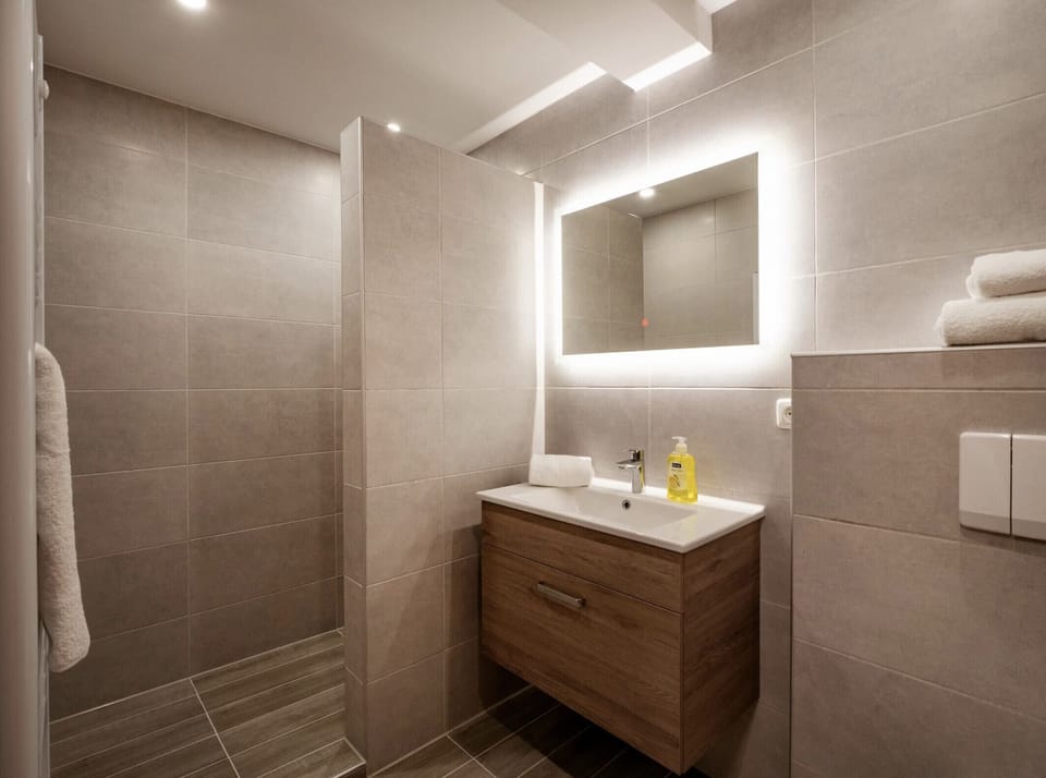Westendorf vacation rental with modern bathroom, shower and a convenient base for skiing, hiking and relaxing mountain vacations.