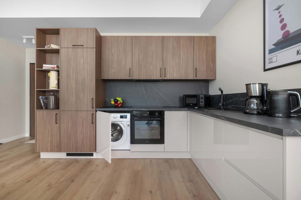 The fully equipped kitchenette includes everything you need for a home-cooked meal.