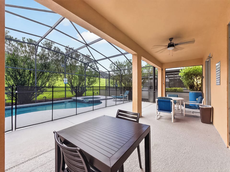 Relaxing Outdoor Pool/Patio Area with Dining Areas